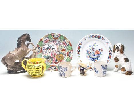 A collection of antique ceramic items to include a Mason's ironstone plates to include one decorated with florals and preciou