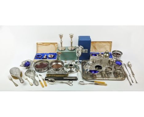 A COLLECTION OF ASSORTED SILVER AND PLATED WARE, including brush set, coasters, toast racks, serving tray, a pair of George I
