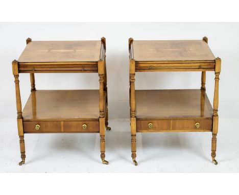 LAMP TABLES, a pair, Georgian style yewwood, each with slide and drawer below on brass castors, 60cm H x 46cm x 46cm. (2) 