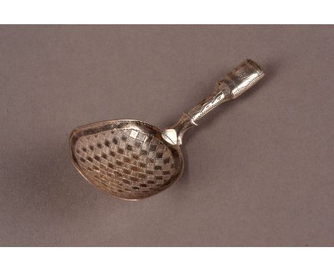 A William IV period silver caddy spoon by T&P, possibly Taylor & Perry, with hollow handle and bright cut geometric design to