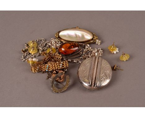 A collection of jewellery, including a large silver locket on chain, a pretty pinchbeck with seed pearl and turquoise bracele