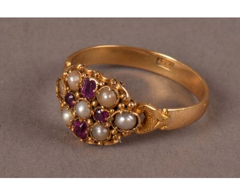 A Victorian period 18ct gold ruby and seed pearl cluster ring, presented in a vintage James Walker box, lacking one pearl, ap