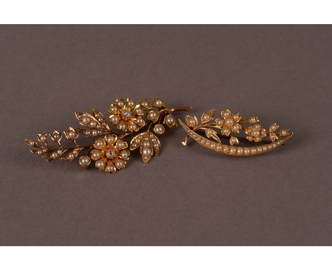 Two Victorian and later gold and seed pearl floral brooches, one larger example set with two brilliant cuts to the flower hea