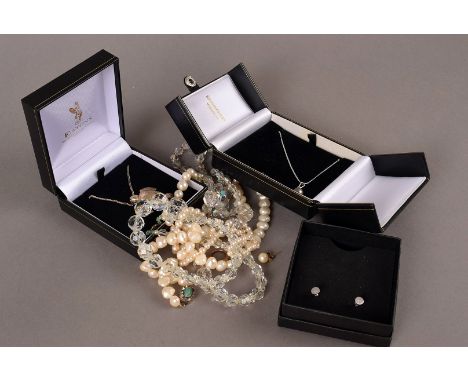 A collection of jewellery, including a necklace and ear studs with black pearls, a white metal pendant and earrings in the fo