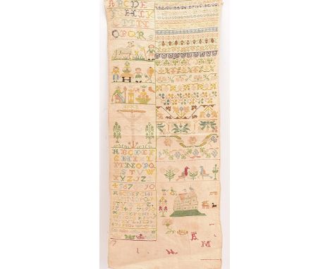 A mid 18th century German long sampler, embroidered on the left with vignettes including the crucifixion, lambs and a lady sp