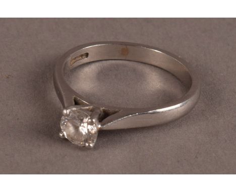 A modern platinum diamond solitaire engagement ring, having an approx. 0.5ct brilliant cut in four claw setting on a platinum