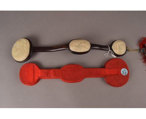 A Chinese celadon jade and wood Ruyi sceptre, each panel carved with quail and flowers, complete with red silk stand, and tas