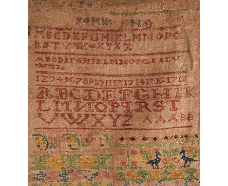 Three 19th century continental samplers, one large linen sampler embroidered in wood with a red alphabet, the bottom with flo