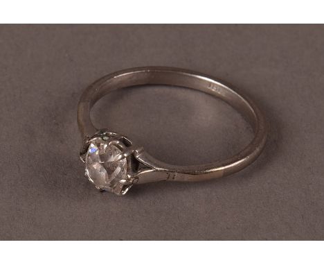 A vintage 18ct white gold and diamond solitaire engagement ring, having an old cushion cut stone of approx. 0.9ct in claw set