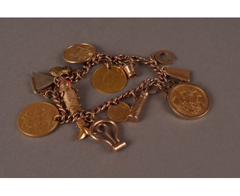 A 9ct gold charm bracelet with two full sovereigns, the 9ct gold curb link chain supporting an Edward VII 1909 sovereign in m