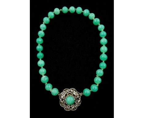 Chinese jade bead necklace with silver open work clasp with a cabochon greenstone/possibly jade bead necklace, signed Liu wit