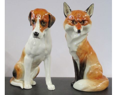 Two Royal Worcester models, of a seated Hound and a Fox, height 7ins