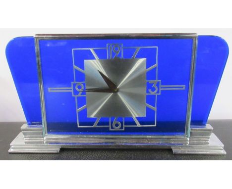 An Art Deco style mantel clock, in chrome and blue plastic, height 5ins