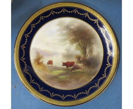 A Royal Worcester plate, painted with lowland cattle by John Stinton, diameter 9ins