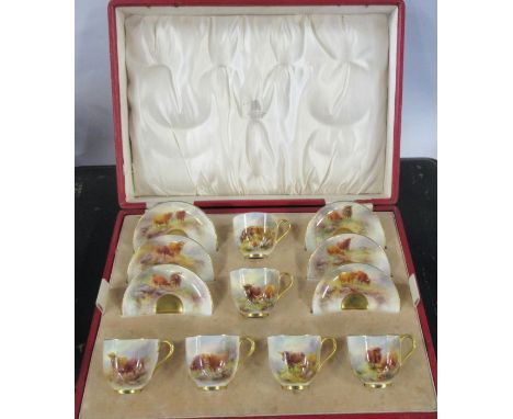 A cased set of Royal Worcester cups and saucers, decorated with Highland cattle in a landscape by Harry Stinton, retailed by 