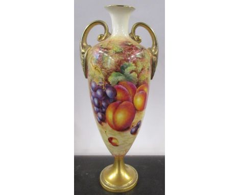 A Royal Worcester pedestal vase, the front decorated with fruit to a mossy background by Freeman, shape number 2710/2, height