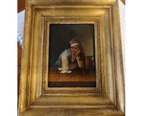 A 19th century oil on panel, man smoking a clay pipe, leaning on a table with three playing cards, 4.75ins x 3.5ins