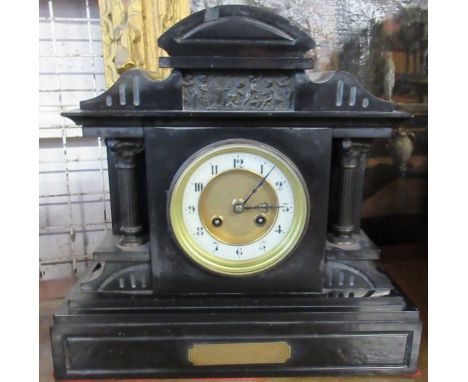 A Victorian black slate mantel clock, together with a mahogany wall bracket