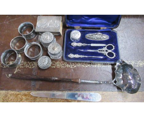 A sterling silver letter opener, engraved initials O.W.A. in fitted case, together with an Antique silver punch ladle, with t