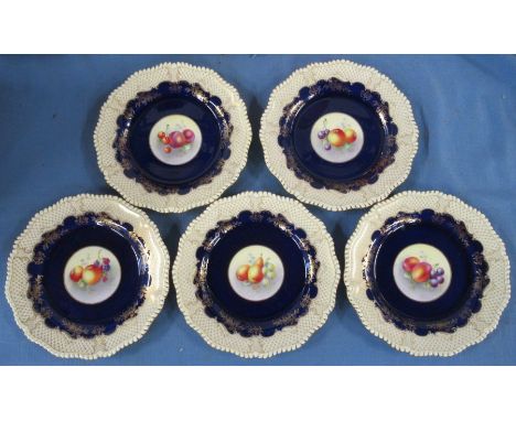 Five Royal Worcester plates, painted with fruit to the centers by Townsend, with wavey gilt edge on cobalt blue edge, all but