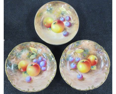 Three Royal Worcester pin dishes, all decorated with fruit to a mossy background by Roberts, diameters 3.75ins and 4ins - One