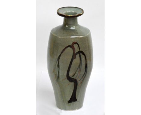 DAVID LEACH (1911-2005) for Lowerdown Pottery; a porcelain bottle of flattened form, iron brushwork on green ground, impresse