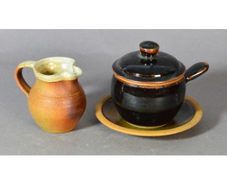 Winchcombe Pottery; a stoneware lidded soup bowl with saucer and a small jug, impressed pottery marks, soup diameter 14cm (in