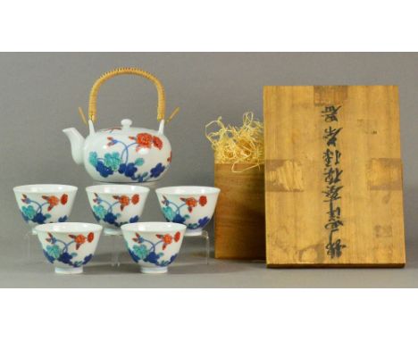 A Japanese Imari porcelain tea set from the reference collection of Bernard Leach, comprising a teapot with cane handle and f