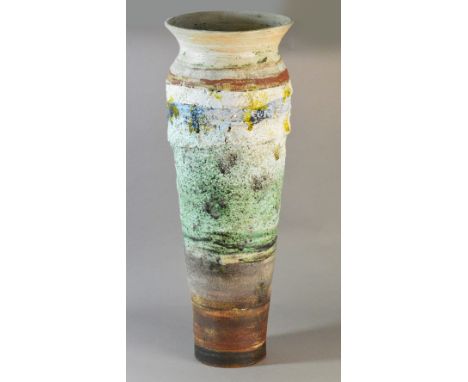 ROBIN WELCH (born 1936); a monumental stoneware floor vase, textured polychrome surface, impressed name and date of 1987, hei