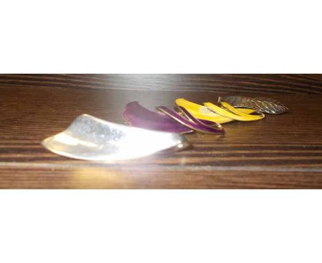 TWO NORWEGIAN ENAMEL SILVER BROOCHES
both in the same scrolling style, one in yellow, the other in purple; together with two 