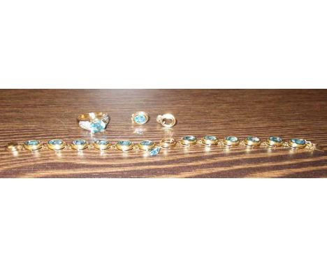 TOPAZ RING, BRACELET AND EARRINGS
set with oval blue topaz, the ring with diamonds to the shoulders, ring size M, all in four