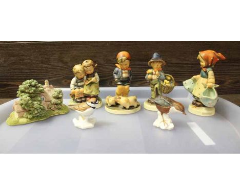 GROUP OF GOEBEL FIGURES
comprising 'Mother Darling', boy with basket, boy with pigs, boy and girl writing etc, tallest figure