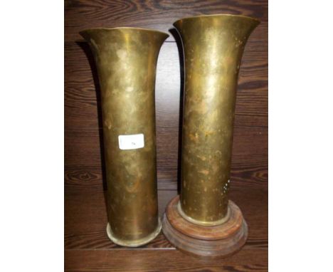 PAIR OF BRASS WWI SHELL ART VASES
a pair of fluted vases formed from shell cases, together with one wooden stand, each 34cm h
