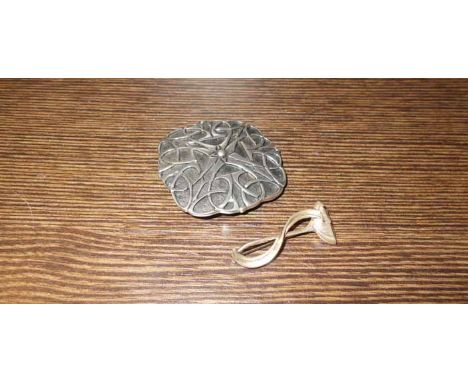 TWO SILVER ORTAK BROOCHES
one of square form with celtic design, the other with art nouveau inspired flower, in an original b