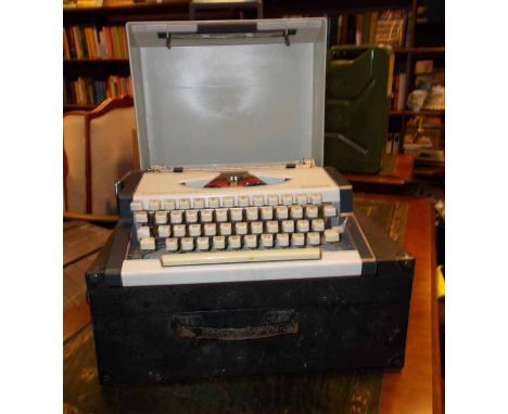 VINTAGE RECORD PLAYER AND VINTAGE TYPEWRITER 