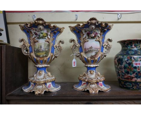 A large pair of Victorian Grainger &amp; Co Worcester twin handled pedestal vases,&nbsp;each painted with a landscape panel a