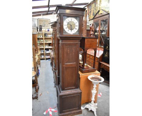 A reproduction oak longcase clock,&nbsp;striking on eight straight gongs, 192cm high, with three weights and pendulum. 