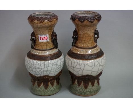 An unusual pair of Chinese crackle glaze vases, late Qing,&nbsp;seal mark to base, 26cm high. 