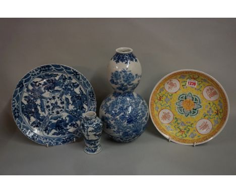 A small group of Chinese and Japanese porcelain, comprising: a yellow ground dish, Guangxu six character mark, 24.5cm diamete