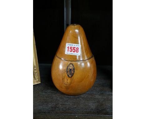 An antique fruitwood pear tea caddy,&nbsp;15cm high. 