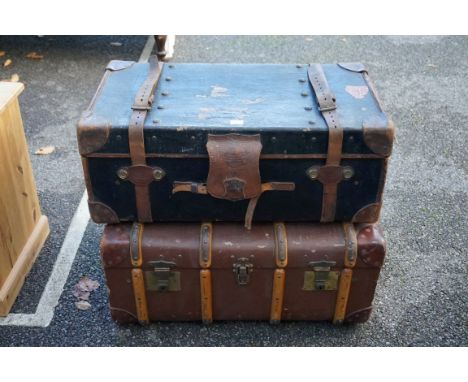 A 'Finnigans of Manchester' canvas and leather bound travelling trunk; together with another trunk, 70cm wide.&nbsp;This lot 