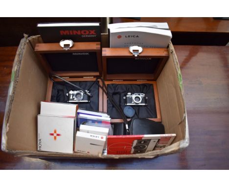 Cameras:&nbsp;two cased Minox 'Leica Collection' miniature cameras, comprising: M3 and IIIf; a Rollei 35B, in case, with inst
