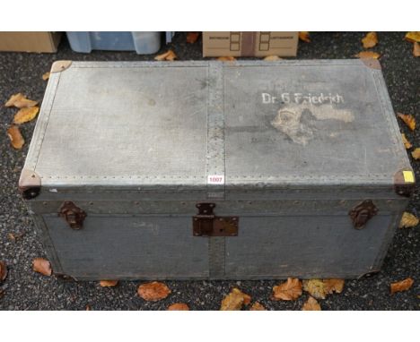 A German metal bound canvas covered travelling trunk, painted 'Dr G Freidrich', by D.R.G.M., 76cm wide.&nbsp;This lot can onl