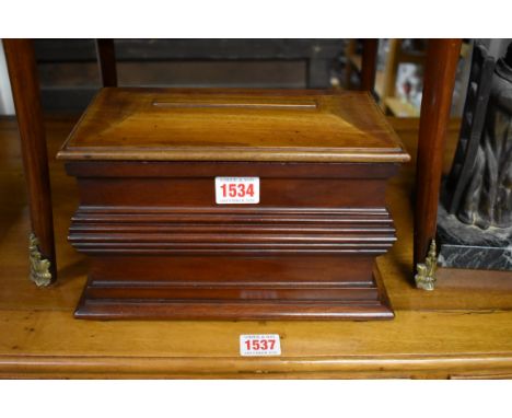 A mahogany tea caddy, 26cm wide.&nbsp; 