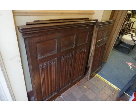 A collection of Victorian linenfold oak panels, by repute from a pulpit, largest panel 110 x 103cm. 
