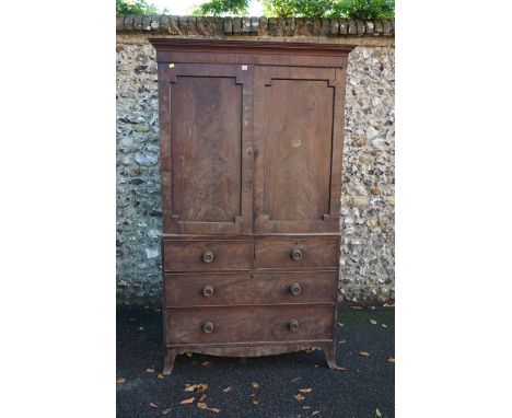 (THH)&nbsp;A George III mahogany linen press, with outswept bracket feet, 121cm wide x 210cm high x 53cm deep.&nbsp;This lot 