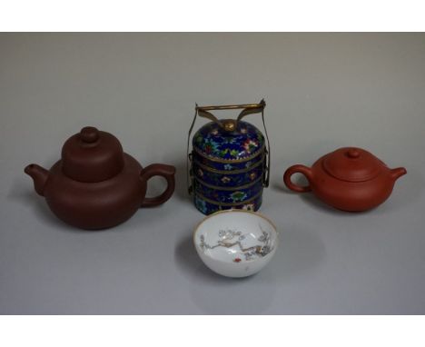 Two Chinese yixing teapots and covers,&nbsp;each with seal mark to base, largest 8.5cm high; together with a Chinese tea bowl