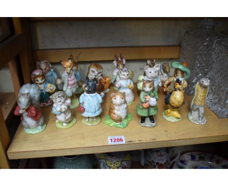 A collection of nineteen Beatrix Potter figures. (19) 