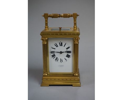 A good gilt brass carriage clock,&nbsp;the enamel dial inscribed 'C Packer &amp; Co, 76 &amp; 78 Regent St', with push button