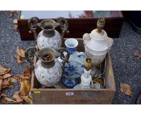 A marble table lamp; together with a pair of continental ceramic vases a Delft vase and one other. This lot can only be colle